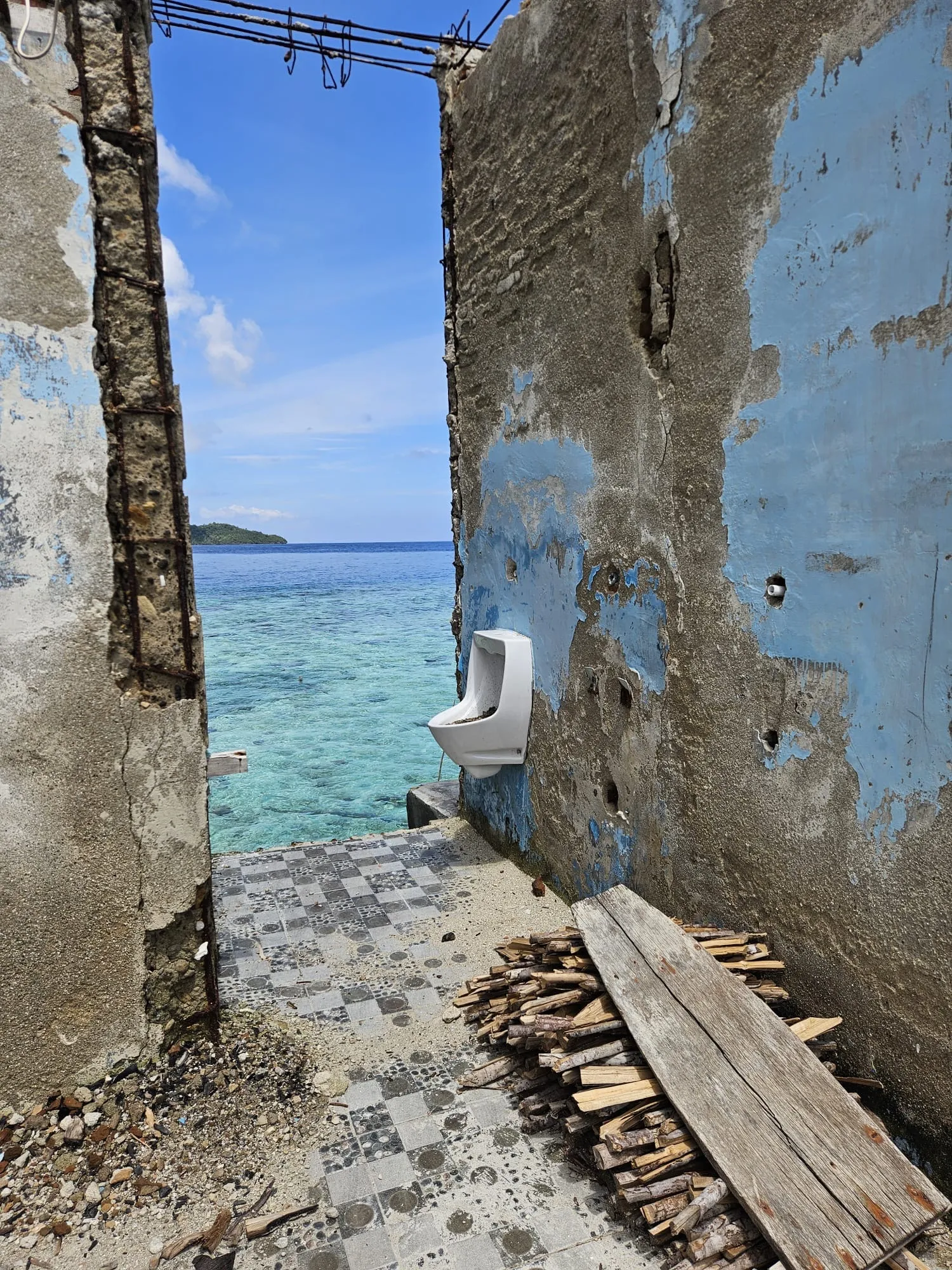 Traditional toilet facilities at Pulau Papan village, Togian Islands, Indonesia